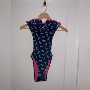Abercrombie and Fitch. Blue bathing suit with bicycle pattern and pink lining